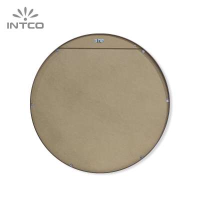 The MDF backing of round wall mirror